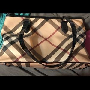 Authentic Burberry purse. Never used.